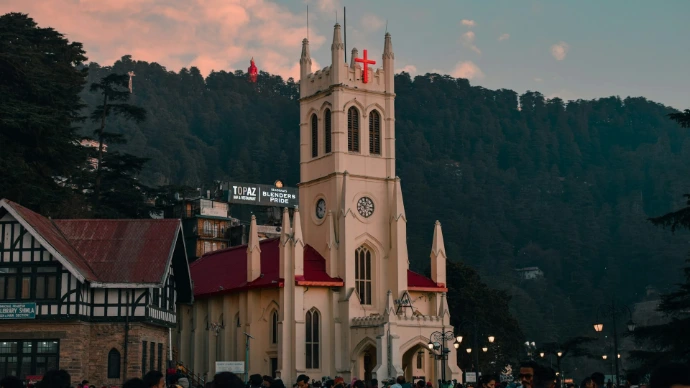 a crowd of people walking around a church